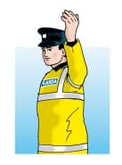 The Garda is beckoning on traffic approaching from either side.