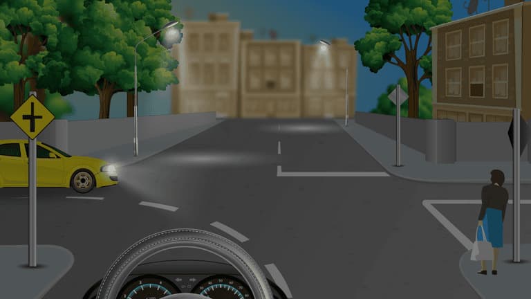 Pedestrians crossing in a dark area might be difficult to see.