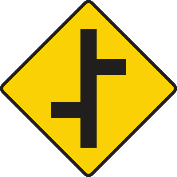 Staggered crossroads ahead with roads of equal importance.