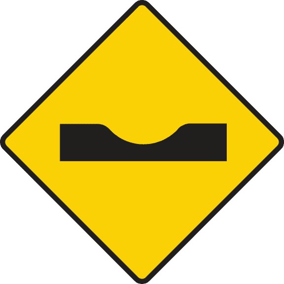 Sharp depression or dip ahead.