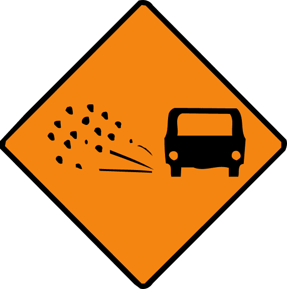 Loose chippings on road.